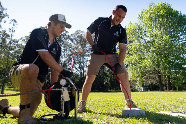 Our professional plumbers clearing blocked drain in Sydney